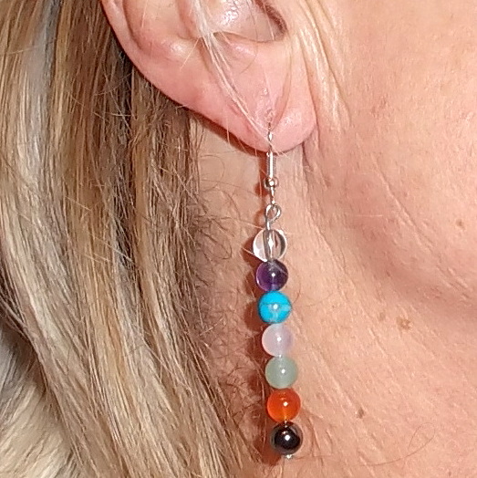 CHakra 6mm bead earings on ear
