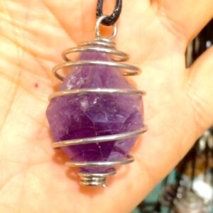 Raw crystal in silver colour spring