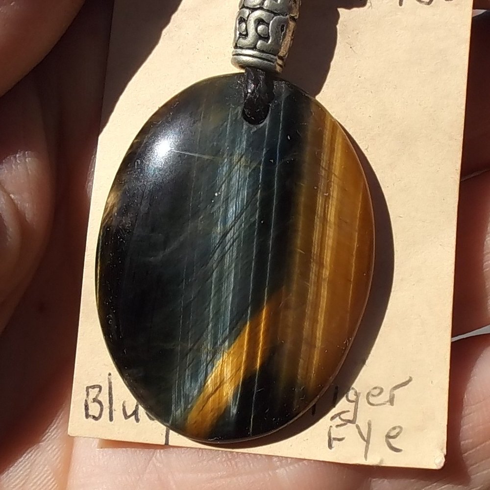 m_Close up Blue-gold Tiger eye cabochon pendant 30x40cm